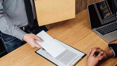 a professional checks their phone anxiously as job notifications flash immediate joiner required symbolising how long notice periods can stall career moves in a fast paced hiring market