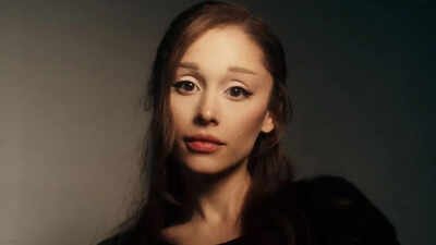 ariana grande unveils new album petal explains title full of life and growing