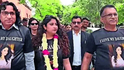 relatives welcomed pranita with garlands and distributed sweets