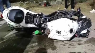 the bike coming from behind rammed into the rear portion of the car at a high speed