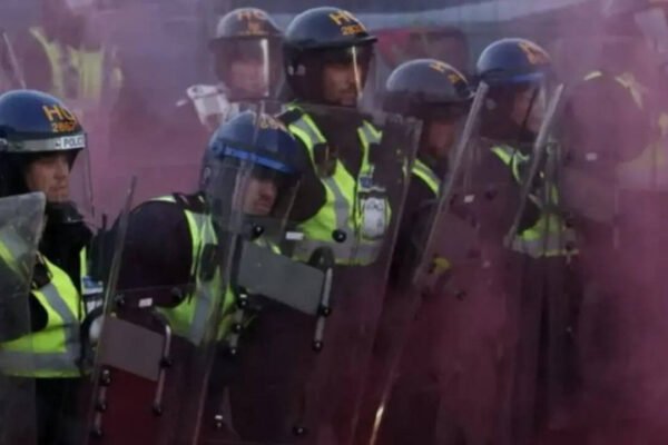 Henry Nowak murder protest turns violent 11 police officers injured