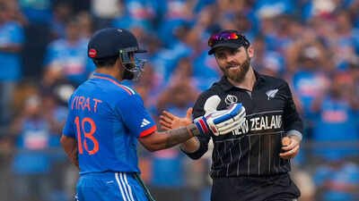 mumbai india39s virat kohli being congratulated by new zealands captain kane wi