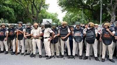 police personnel stand guard near
