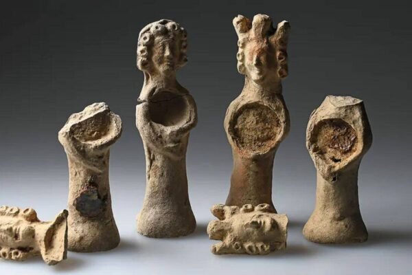 Archaeologists discover a rare 600 year old saint statue and human bone