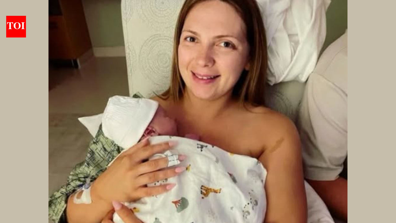 In a first UK woman undergoes womb surgery to