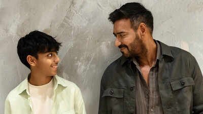 ajay devgn visits trimbakeshwar temple holding son yugs hand during sawan amid tight security as fans gather outside