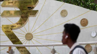 rupee rises 9 paise against us dollar