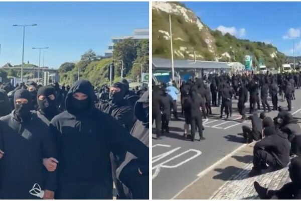 Police slow to respond as masked men block roads to