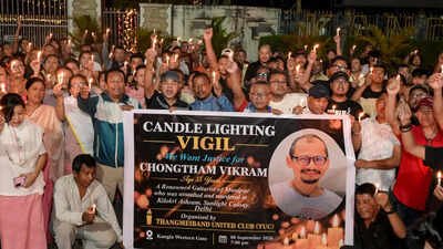 candlelight vigil in imphal over killing of manipuri musician in delhi