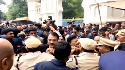 police personnel push back bharat rashtra samithi brs leaders during a scuffle while detaining them during a protest outside the telangana assembly in hyderabad