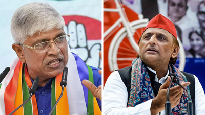up congress in charge rajendra pal gautam and sp chief akhilesh yadav